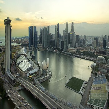 The Float@Marina Bay is the dark quadrilateral at foreground right of this view of Marina Bay from the Singapore Flyer, taken in 2012