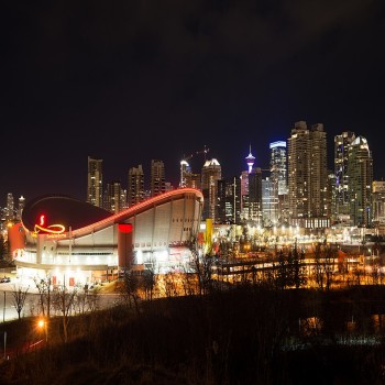 The Saddledome and Calgary skyline at night