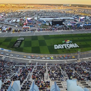View of cars racing on the front stretch at the 2024 Daytona 500