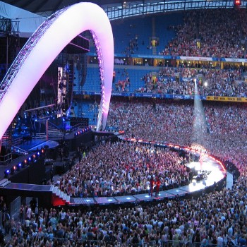 Side view of Take That on stage