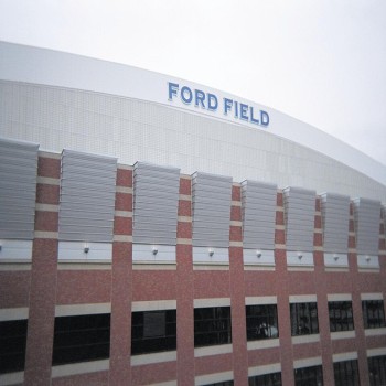 Ford Field allows natural light to penetrate through gray translucent roof panels.