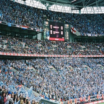 Portsmouth fans celebrate winning the FA Cup against Cardiff City in 2008. The 89,874 attendance is the largest football attendance in the new Wembley's history.