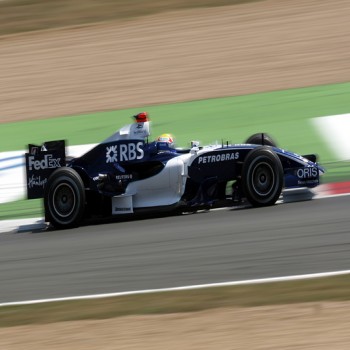 The circuit features several high-speed chicanes with prominent kerbs, such as the Imola chicane. (Mark Webber pictured driving for Williams).