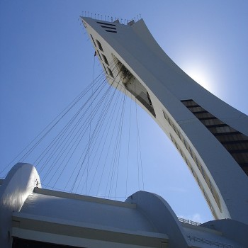 Tower with cables for retractable roof