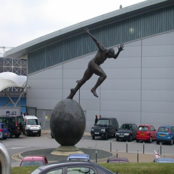 Colin Spofforth's giant bronze sculpture, The Runner, at SportCity
