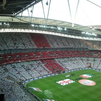 Fans of the England football team create the St George's Cross.
